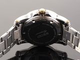 a close up of a wrist watch on a table