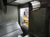 a machine that is working on a piece of metal