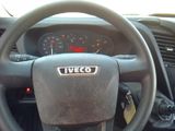 a steering wheel of a vehicle with a clock on it