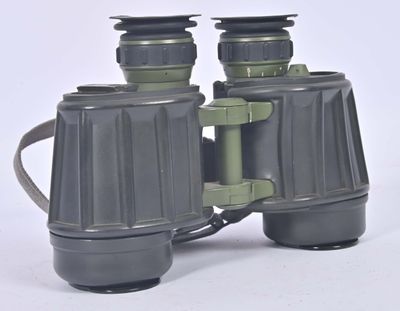 a pair of binoculars that are sitting on a table