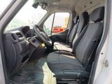 a white van with black seats in the back of it