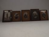 three framed pictures of a city with a clock tower in the background