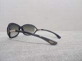a pair of sunglasses on a table with a white background