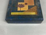 a blue box with a picture of a palm tree on it