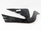 a black bird shaped object on a white surface