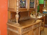 an image of a large wooden cabinet in a room