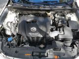 a picture of a car engine with its hood open