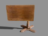 une petite table avec un plateau en bois posée sur un piètement