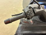 a close up of a motorcycle handle on the handlebars