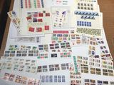 a table with a lot of stamps on it
