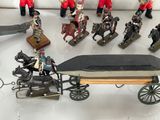 a lot of figurines that are sitting on a table