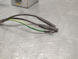 two wires that are connected to an electrical device