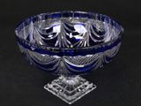 an image of a blue glass bowl on a black background