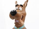 a close up of a figurine of a dog with his mouth open