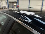 a car that has a sticker on the roof of it