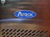 an image of a close up of a metal door with a blue logo on it
