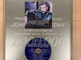 an image of a plaque with a picture of a man holding a guitar