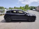 a picture of a black car parked on the side of the road