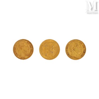 three gold coins, one of which is a sovereign and one of which is a sovereign