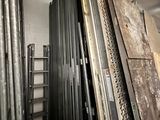 a room with a bunch of metal frames in it