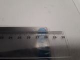 a close up of a ruler on a table