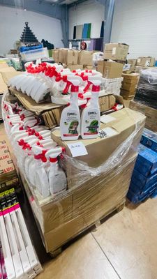 many boxes of toilet paper and toilet paper on the floor