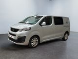 a picture of a silver van parked in a room