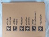 a cardboard box that has a bunch of different signs on it