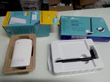 a box of toilet paper, a roll of toilet paper, and a box of toilet paper on a table