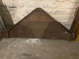 a corner of a room with a door and a window in it