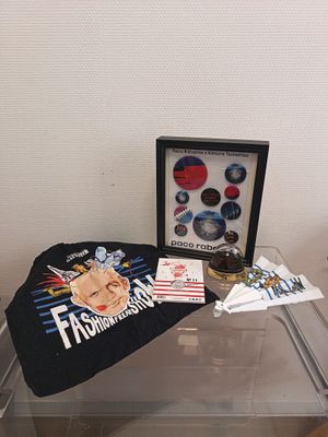 a picture of a hat and other items on a table
