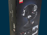 a box with a lego star wars helmet inside of it