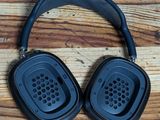 a pair of headphones sitting on a wooden table