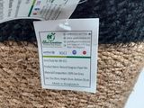 a woven basket with a tag on it