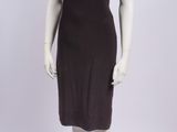 the mannequin is wearing a brown dress with a black top