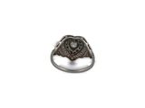 an image of a close up of a ring on a white surface