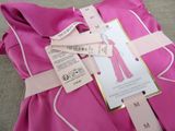 a picture of a pink dress with a tag attached to it
