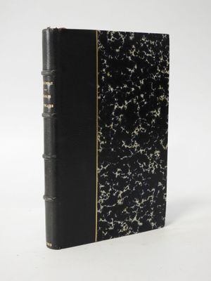 a black and gold book with a black cover on a white background