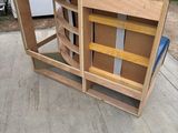 a pile of furniture that is sitting on the sidewalk