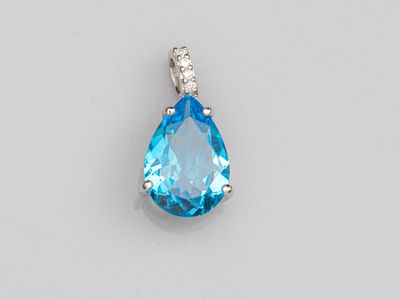 a blue topaz quartz and diamond pendant