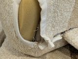 a stuffed animal that has been wrapped in a blanket