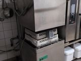 an image of a commercial kitchen with stainless steel appliances