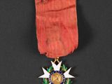 a close up of a medal with a star on it