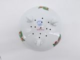 a white porcelain object with flowers and birds on it