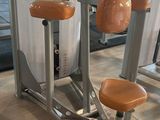 a picture of a gym room with equipment in it