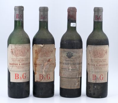trois bouteilles de vin sont alignées sur une surface blanche