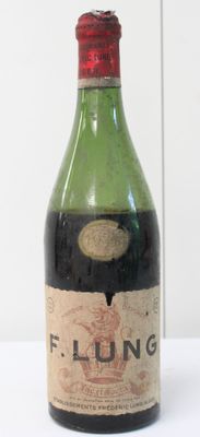 a bottle of wine that is sitting on a table