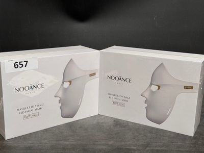 two boxes of noosance products on a table with a black background