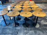 tables and stools are arranged in a circle on the floor