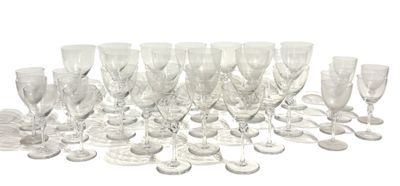 a lot of empty wine glasses sitting on a table